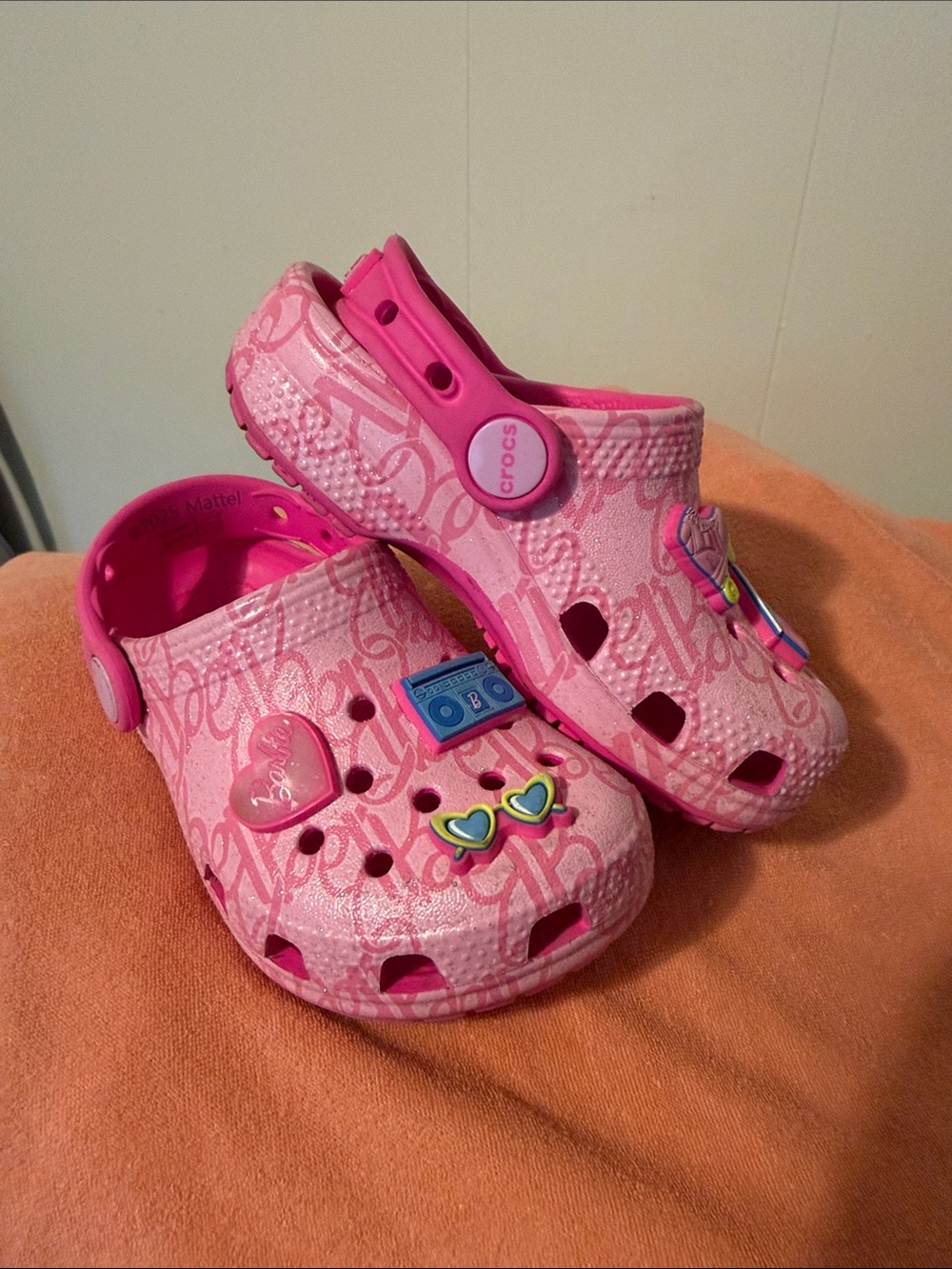 CROCS Kids Pink Patterned Clogs with Charm Accents
